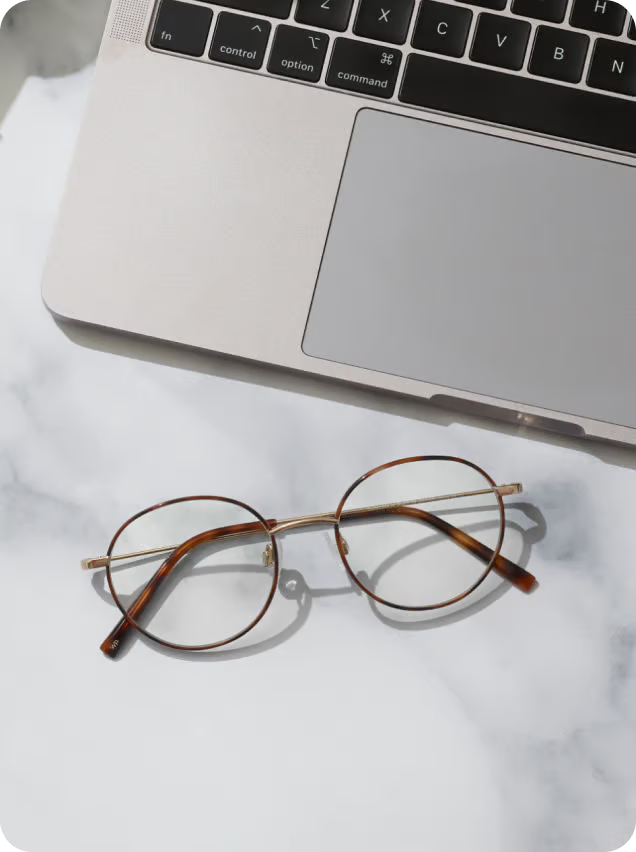 Premium prescription eyeglasses on marble surface